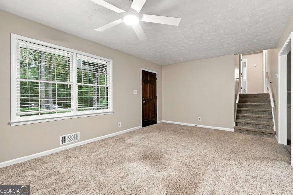 4 bedroom, 2 bathroom, 1,585 sq ft single family residence for sale at 3450 Lake Drive, Lawrenceville, GA 30044 — photo 5