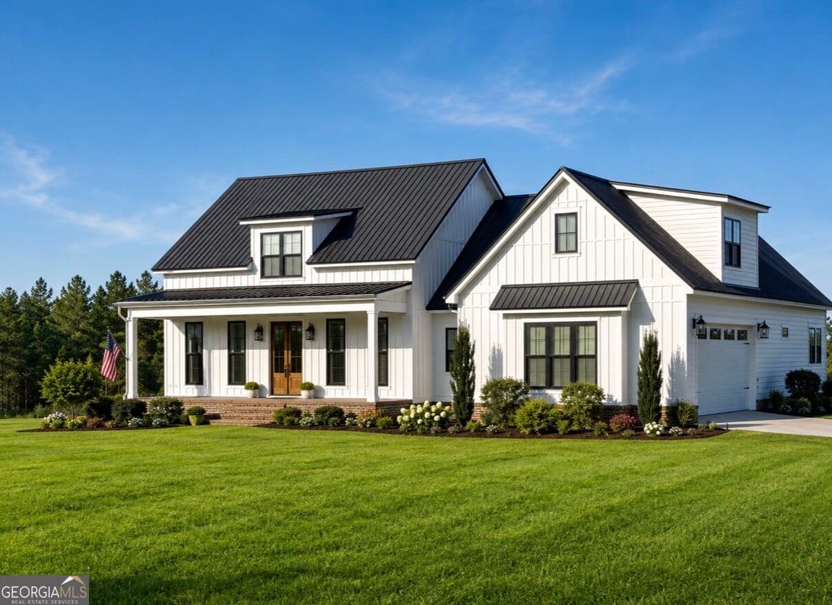 4 bedroom, 3.5 bathroom, 2,724 sq ft single family residence for sale at 9999 Lynntown Road, Collins, GA 30421 — photo 1 of 28