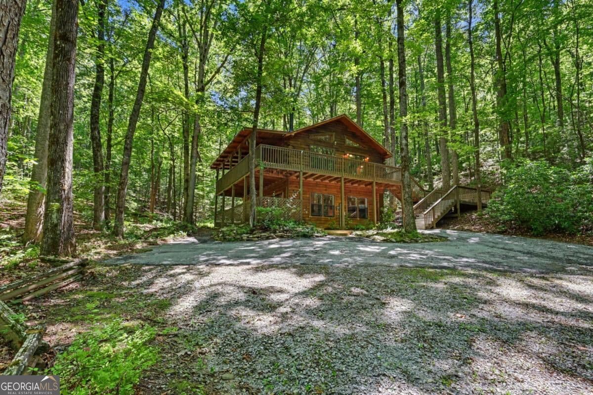 3 bedroom, 2 bathroom, 1,560 sq ft cabin,single family residence for sale at 252 Navigator Lane, Tiger, GA 30576 — photo 2