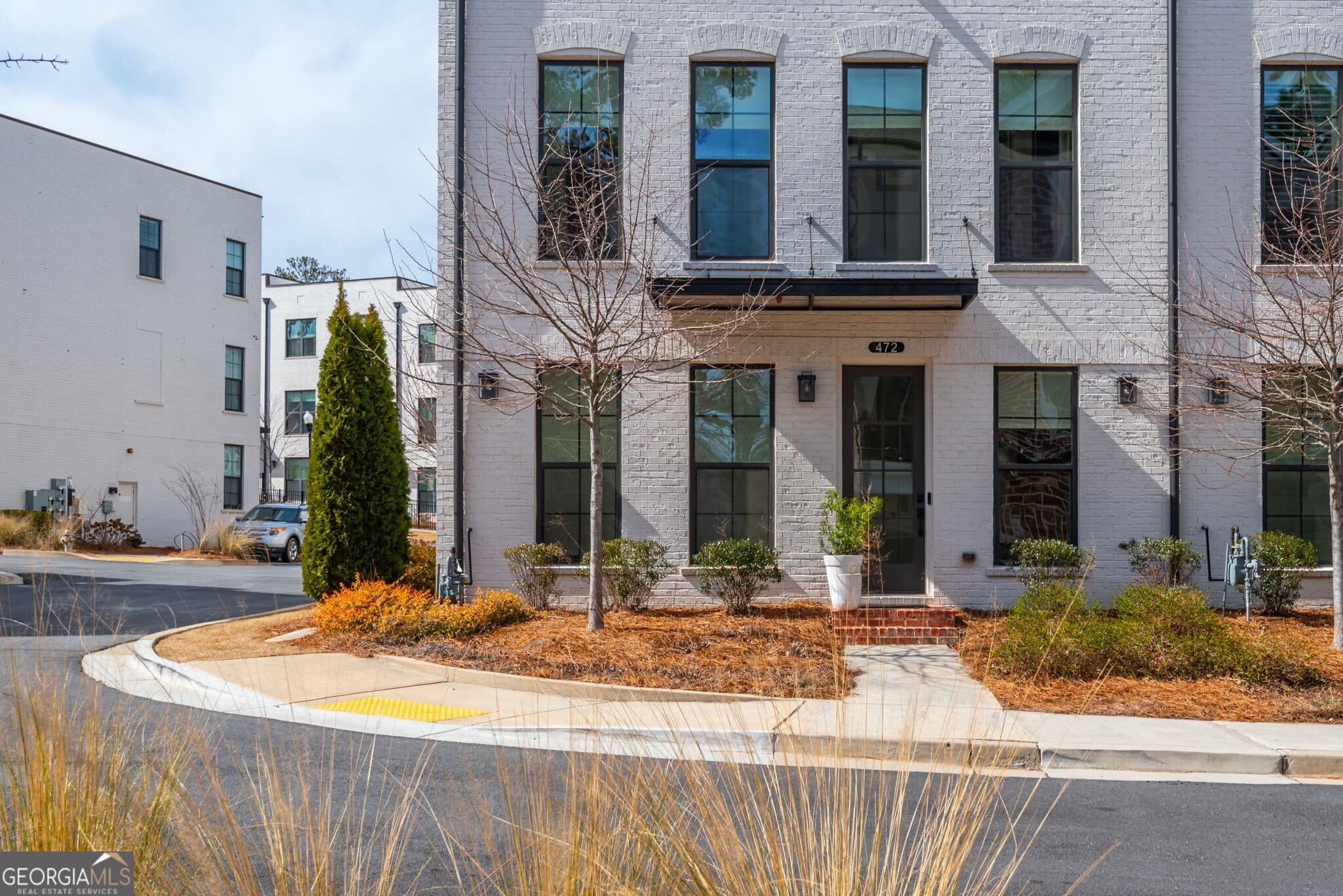 4 bedroom, 3.5 bathroom, 2,226 sq ft townhouse sold at 472 Burton Drive, Alpharetta, GA 30009