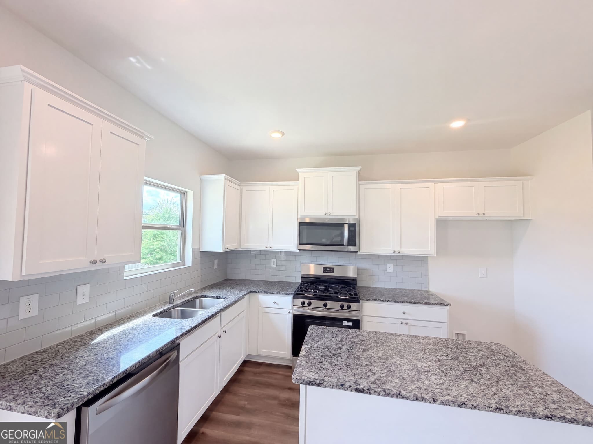 4 bedroom, 2.5 bathroom, 2,416 sq ft single family residence for sale at 2048 Massey Lane, Winder, GA 30680 — photo 2