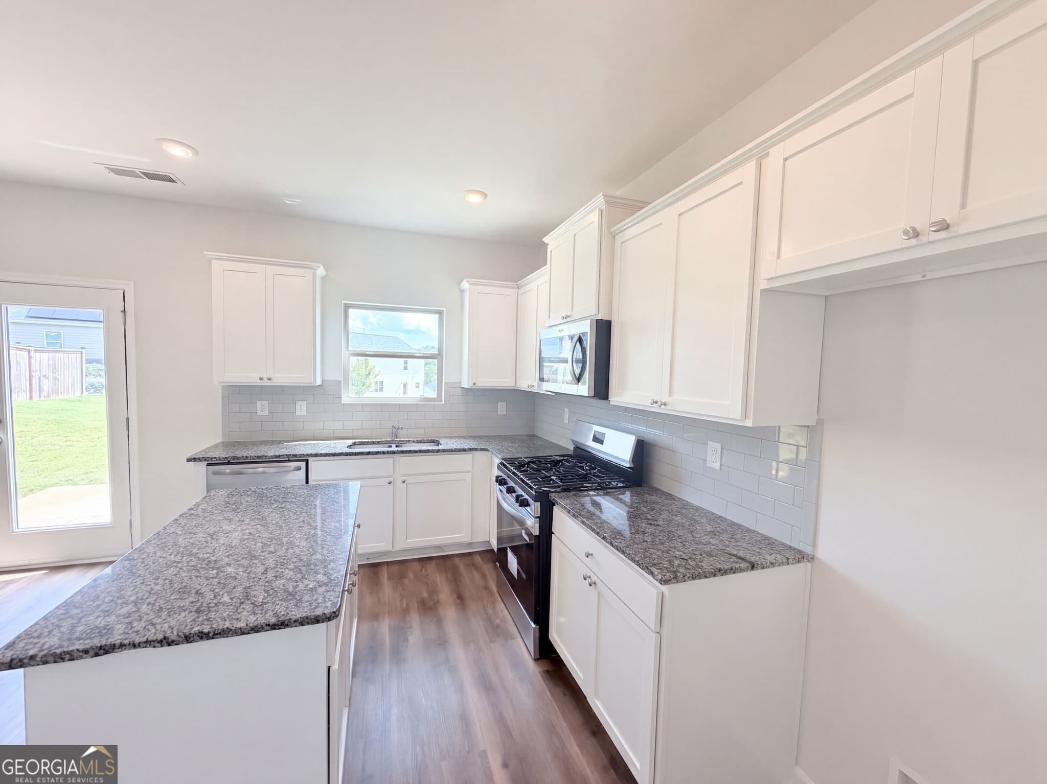 4 bedroom, 2.5 bathroom, 2,416 sq ft single family residence for sale at 2048 Massey Lane, Winder, GA 30680 — photo 9