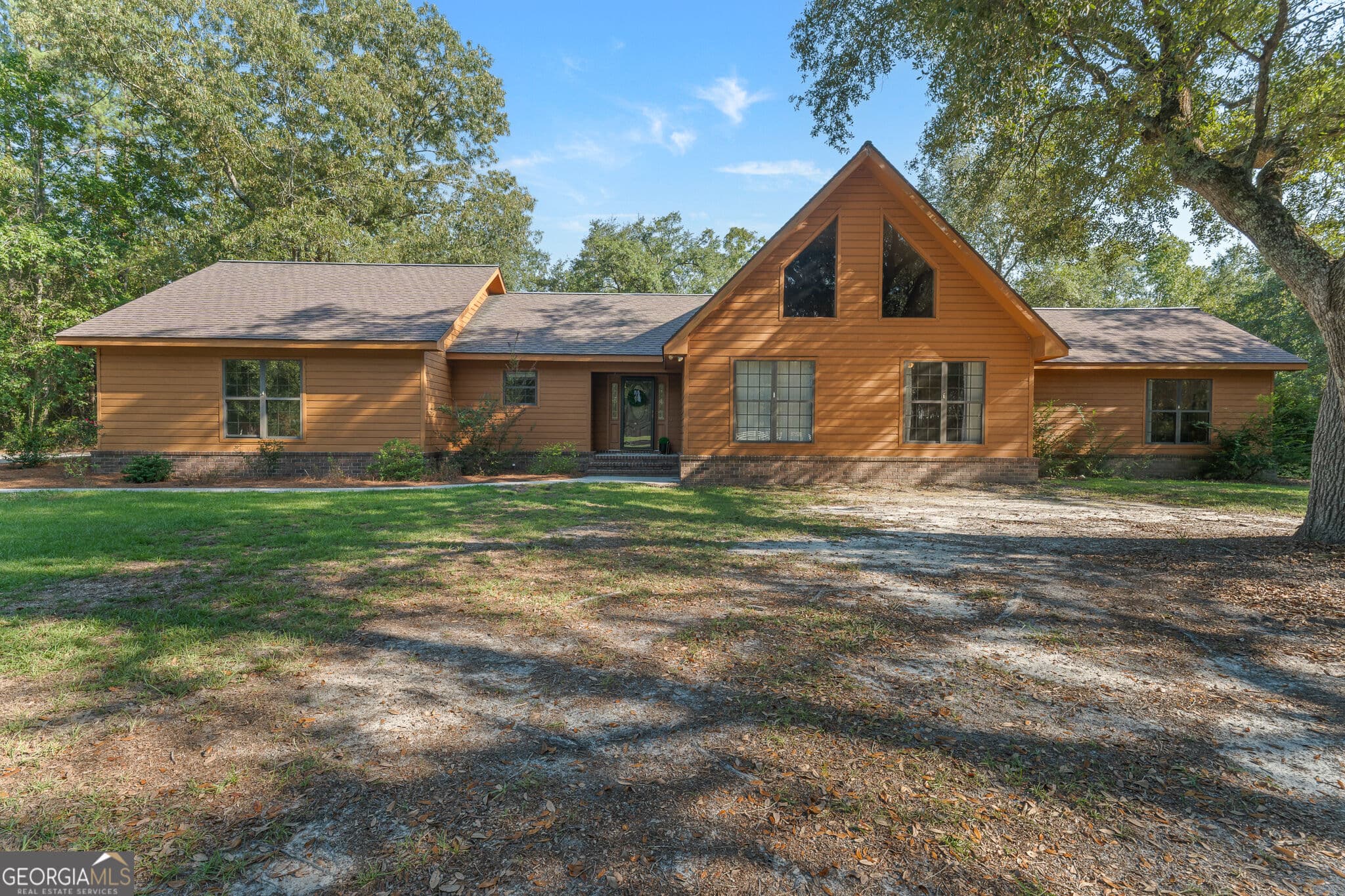 3 bedroom, 3 bathroom, 2,678 sq ft single family residence for sale at 1021 Ig Lanier Road, Pembroke, GA 31321 — photo 1 of 47