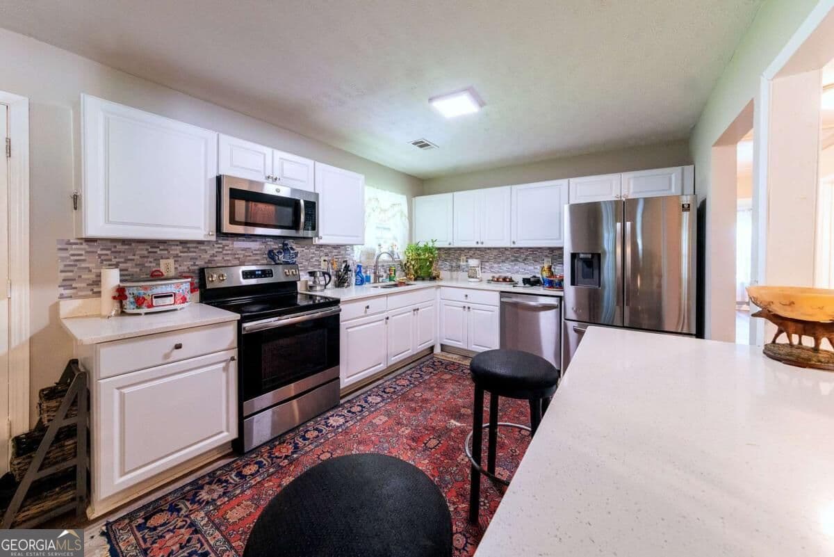 3 bedroom, 1.5 bathroom, 1,067 sq ft single family residence for sale at 2985 Catalina Drive, Decatur, GA 30032 — photo 6