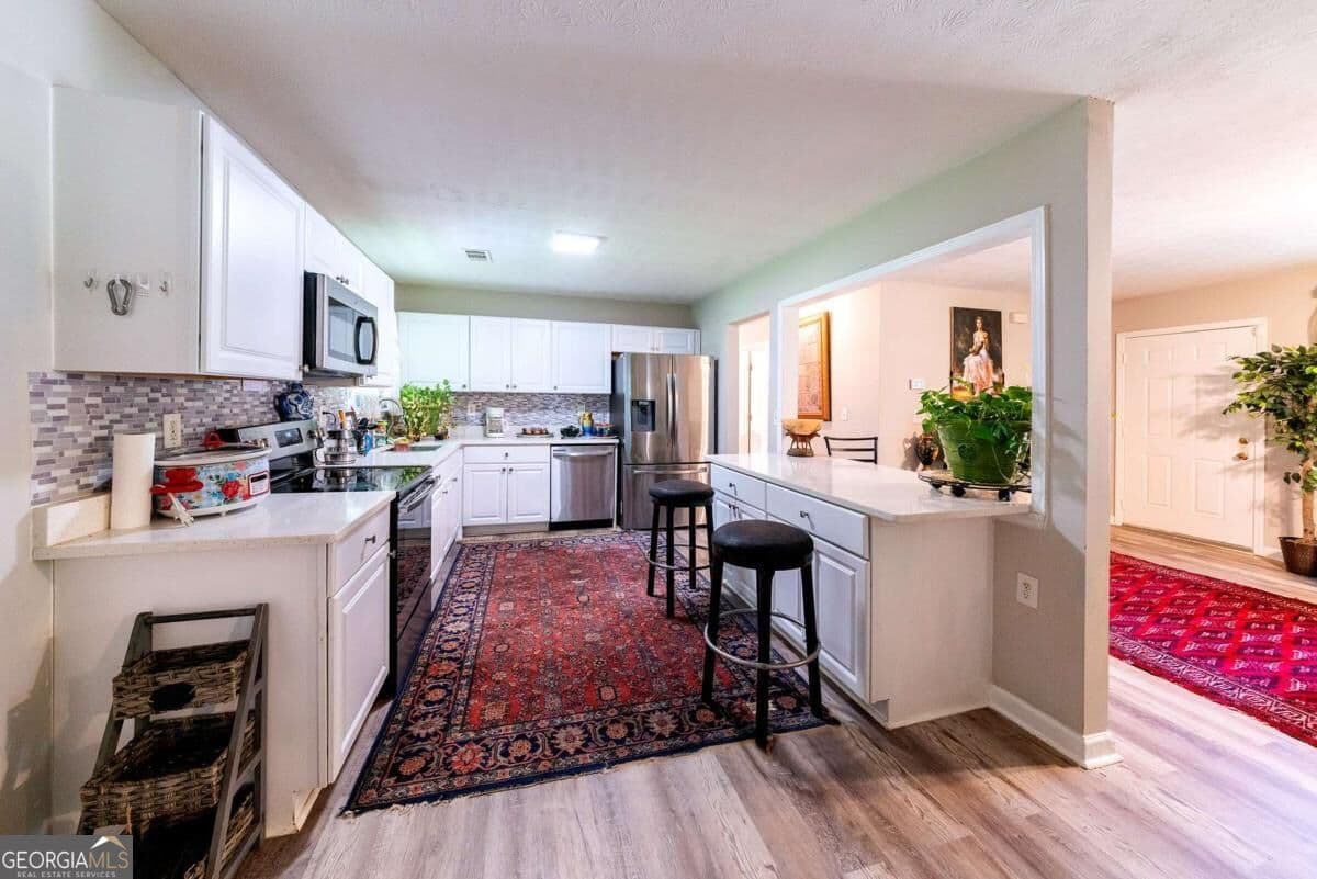 3 bedroom, 1.5 bathroom, 1,067 sq ft single family residence for sale at 2985 Catalina Drive, Decatur, GA 30032 — photo 5