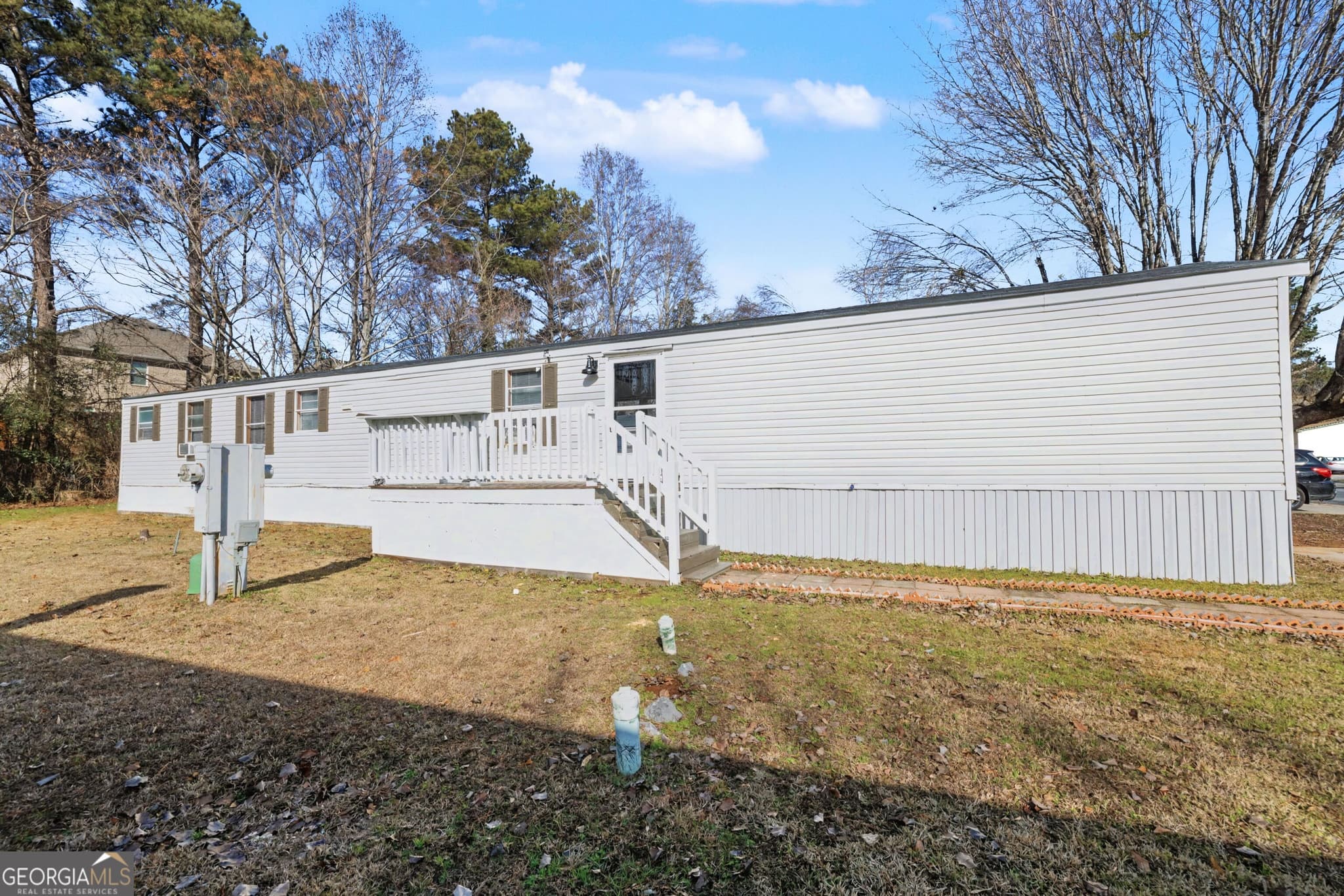 3 bedroom, 2 bathroom, 1,064 sq ft manufactured home,single family residence for sale at 73 Lillian Circle, Stockbridge, GA 30281
