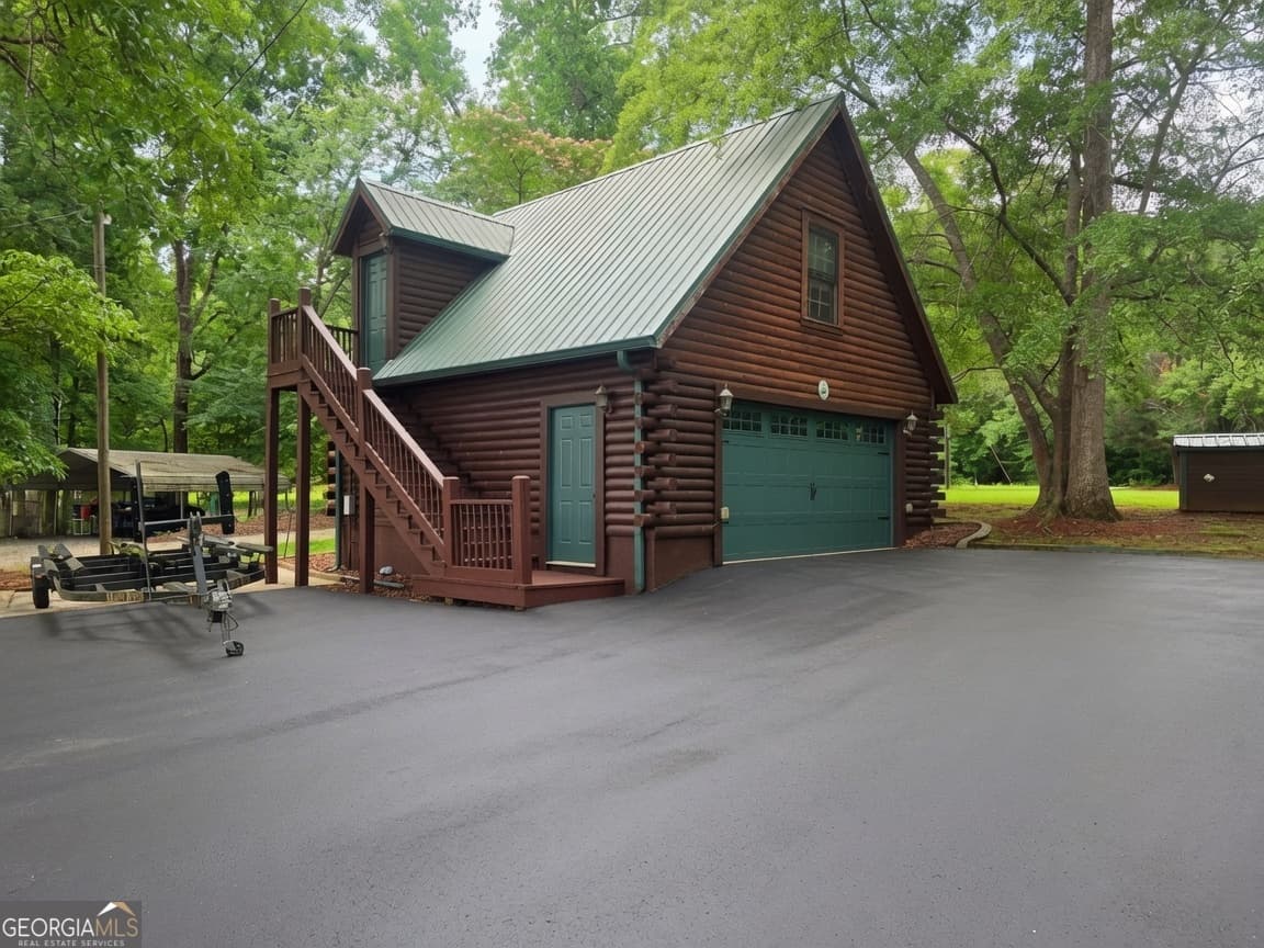 3 bedroom, 3.5 bathroom, 2,256 sq ft cabin,single family residence for sale at 172 Montego Bay Road, Milledgeville, GA 31061 — photo 8