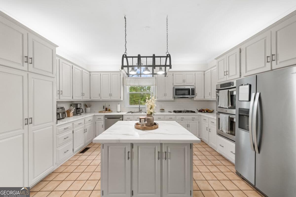 5 bedroom, 4.5 bathroom, 6,515 sq ft single family residence for sale at 313 Miller Street, Statesboro, GA 30458 — photo 9