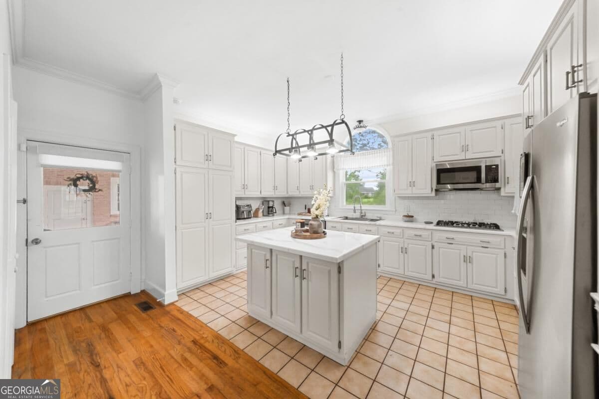 5 bedroom, 4.5 bathroom, 6,515 sq ft single family residence for sale at 313 Miller Street, Statesboro, GA 30458 — photo 8