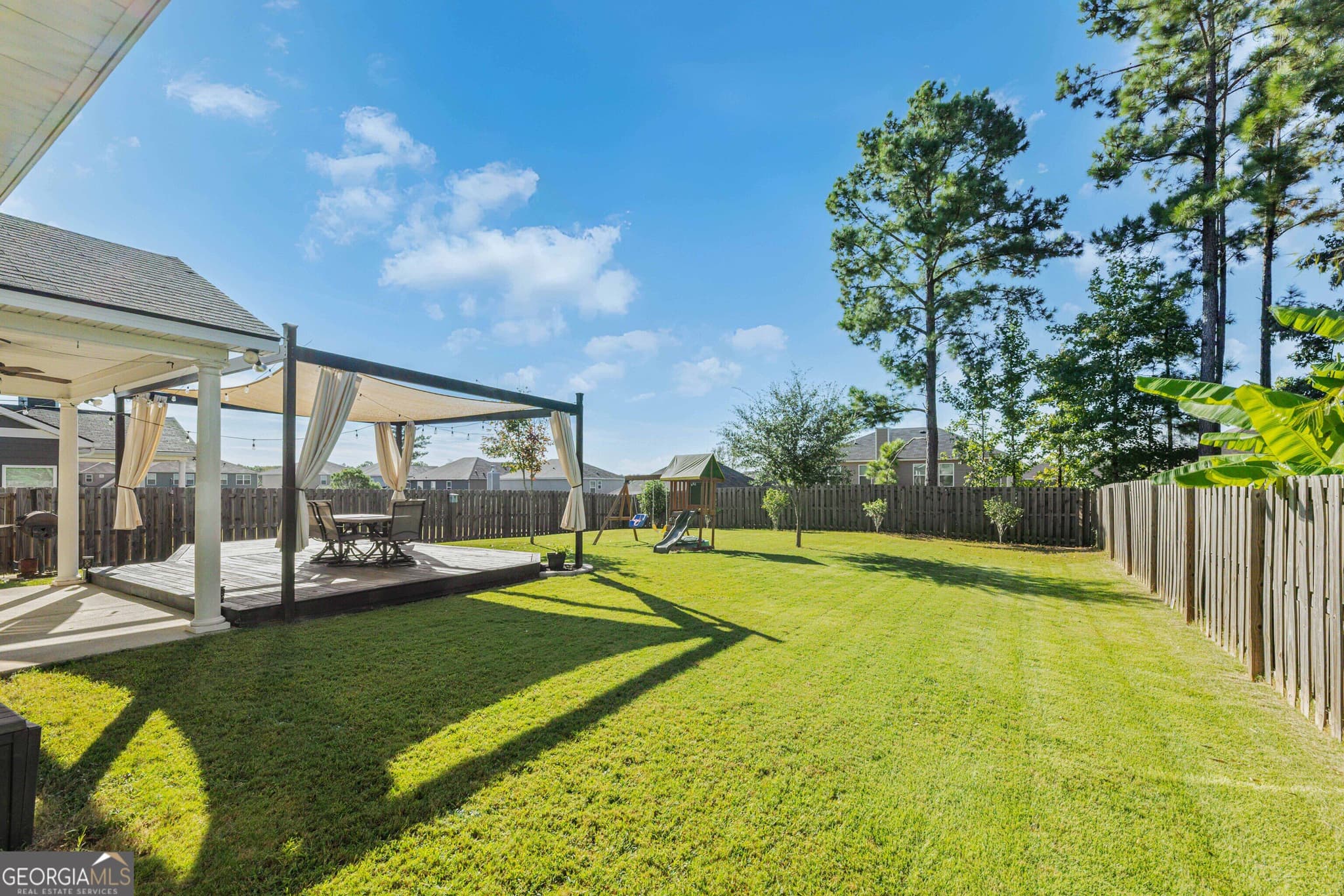 4 bedroom, 2.5 bathroom, 2,606 sq ft single family residence for sale at 8082 Garrett Pines Drive, Midland, GA 31820 — photo 2