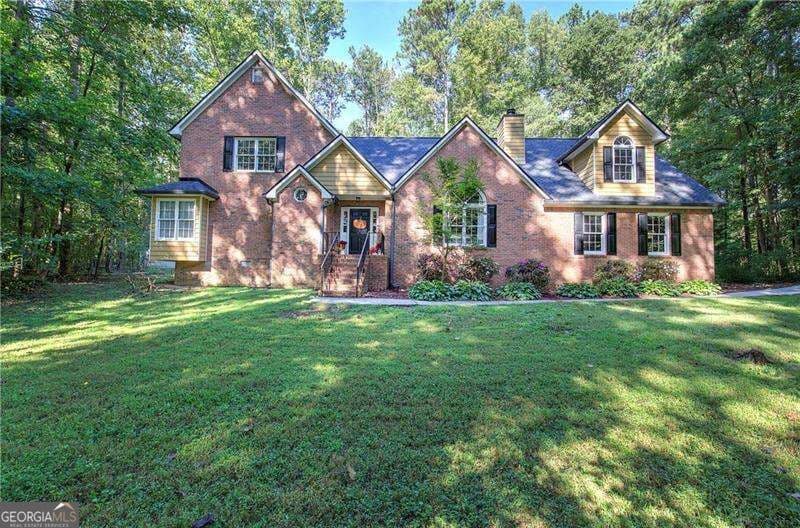 4 bedroom, 2.5 bathroom, 2,931 sq ft single family residence for sale at 5180 Brownwood Drive, Powder Springs, GA 30127 — photo 1 of 63