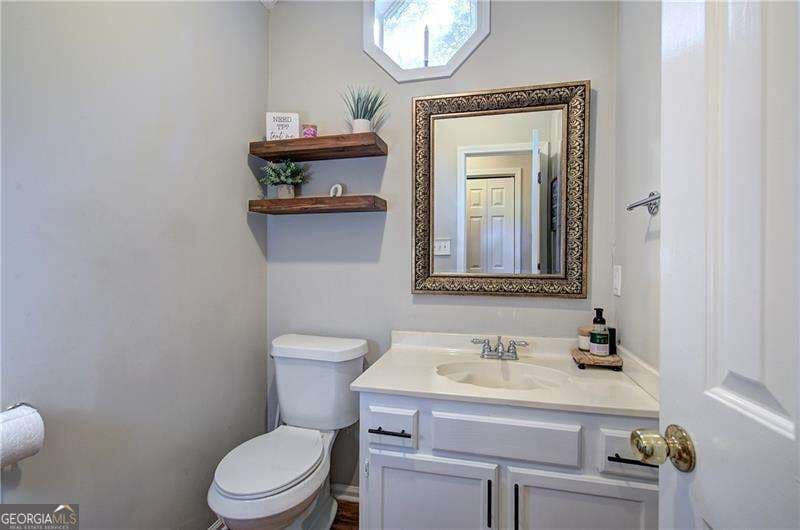 4 bedroom, 2.5 bathroom, 2,931 sq ft single family residence for sale at 5180 Brownwood Drive, Powder Springs, GA 30127 — photo 5
