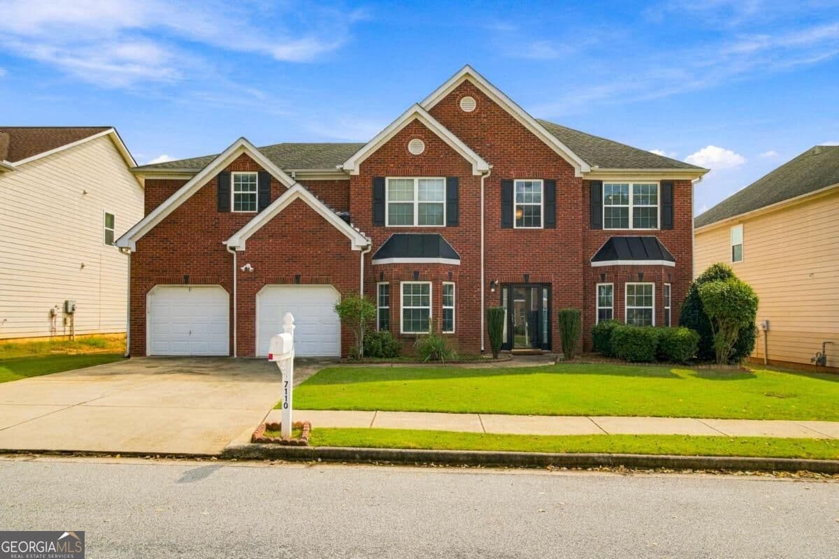 5 bedroom, 3 bathroom, 3,621 sq ft single family residence for sale at 7110 Smithers Way, Atlanta, GA 30331 — photo 1 of 71