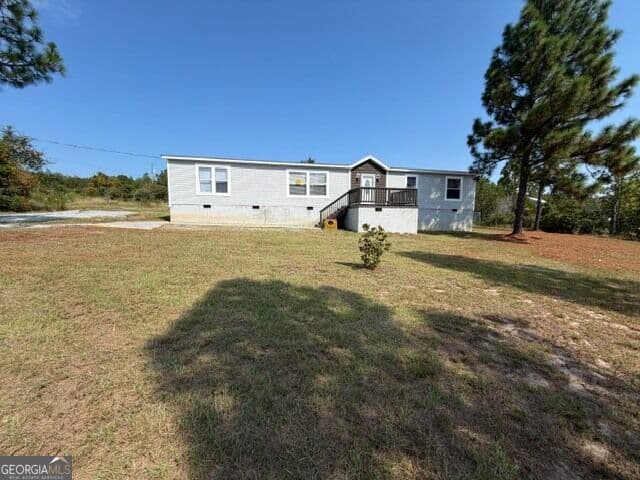4 bedroom, 2 bathroom, 1,650 sq ft manufactured home,single family residence under contract at 2883 Carl Sutton Road, Lizella, GA 31052 — photo 3