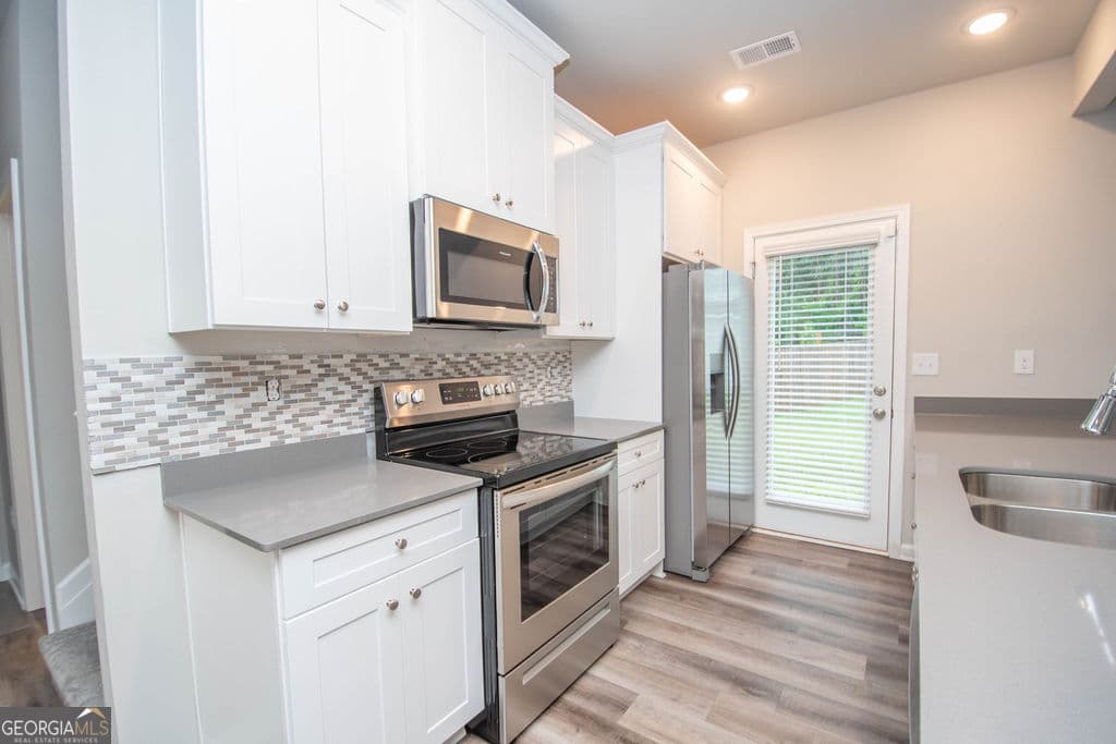 3 bedroom, 2 bathroom, 1,322 sq ft single family residence for sale at 107 Hidden Hills Drive, Carrollton, GA 30117 — photo 9