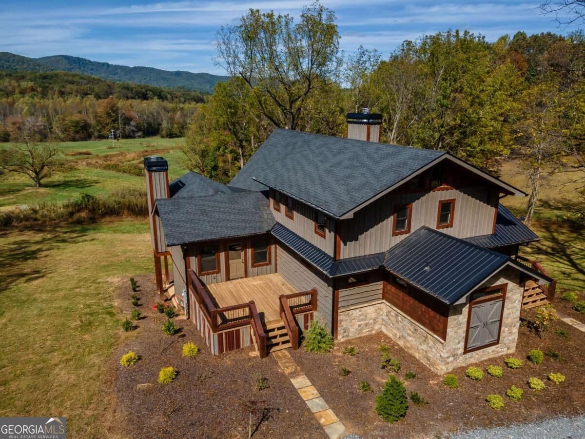 4 bedroom, 3.5 bathroom, 3,864 sq ft cabin,single family residence for sale at 7590 Mobile Road, Blue Ridge, GA 30513 — photo 2