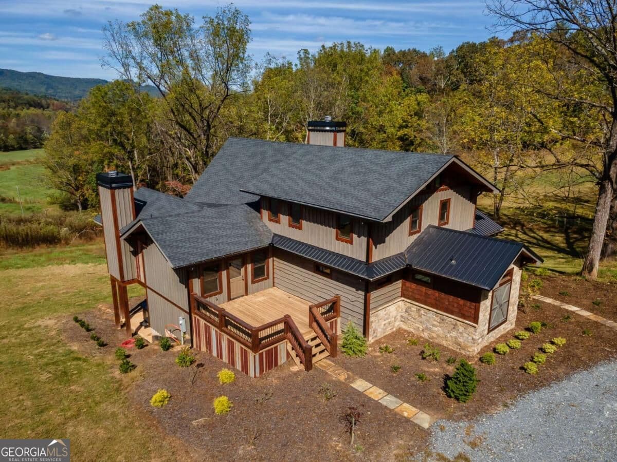 4 bedroom, 3.5 bathroom, 3,864 sq ft cabin,single family residence for sale at 7590 Mobile Road, Blue Ridge, GA 30513 — photo 3