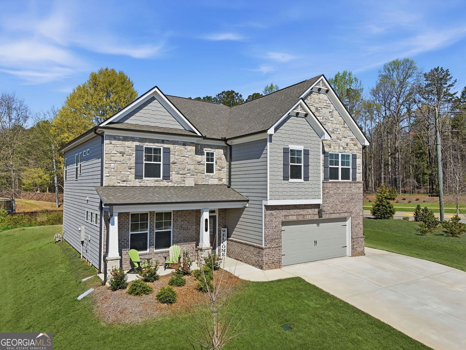 5 bedroom, 4 bathroom, 3,301 sq ft single family residence for sale at 22 Winding Rose Drive, Hoschton, GA 30548 — photo 3