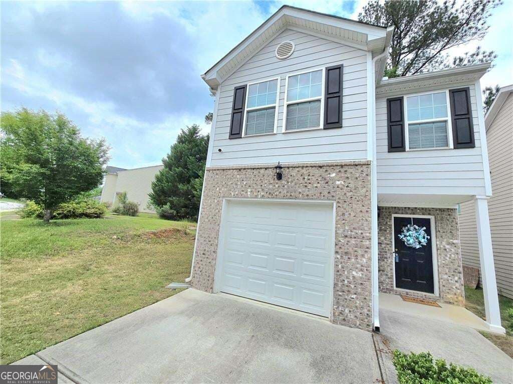 3 bedroom, 2.5 bathroom, 1,600 sq ft single family residence for sale at 2365 Hackamore Drive, Atlanta, GA 30349 — photo 1 of 19