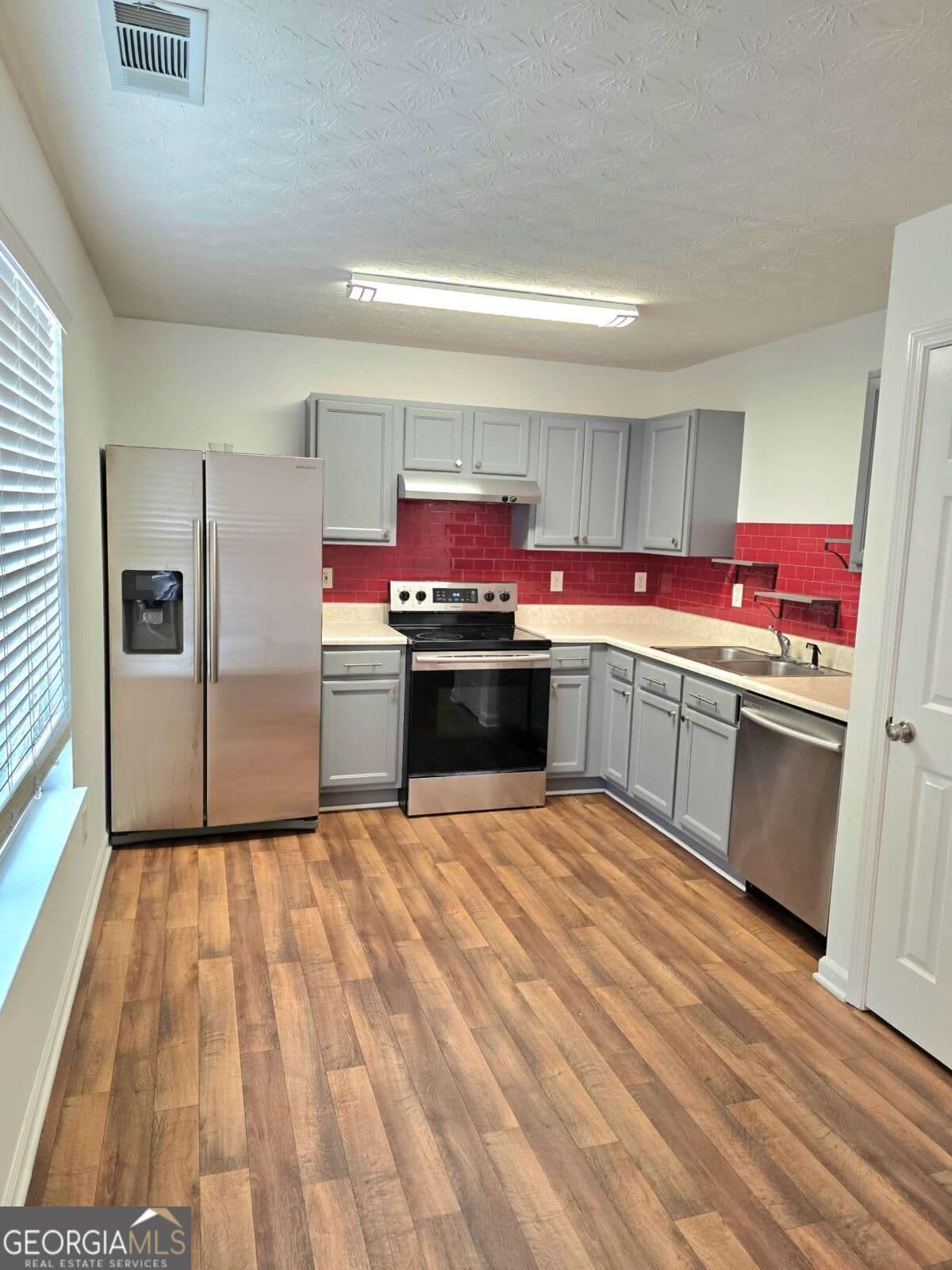 3 bedroom, 2 bathroom, 1,552 sq ft single family residence for sale at 4231 Chestnut Lake Avenue, Lithonia, GA 30038 — photo 8