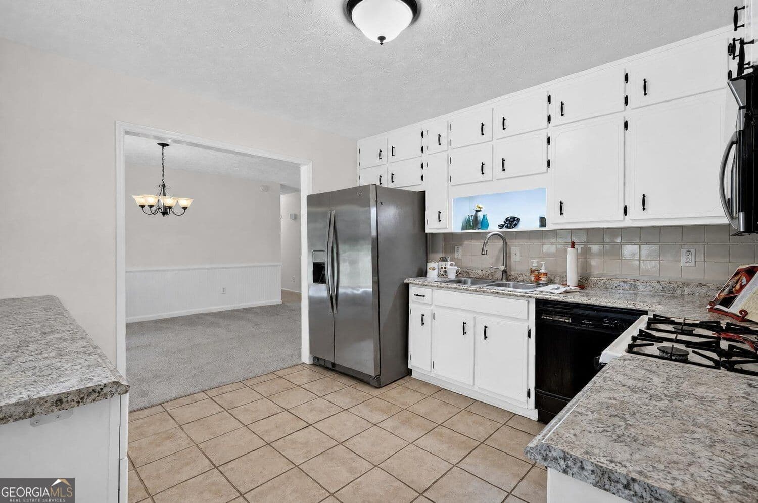 4 bedroom, 2 bathroom, 1,680 sq ft single family residence for sale at 850 The Circle, Lawrenceville, GA 30043 — photo 8