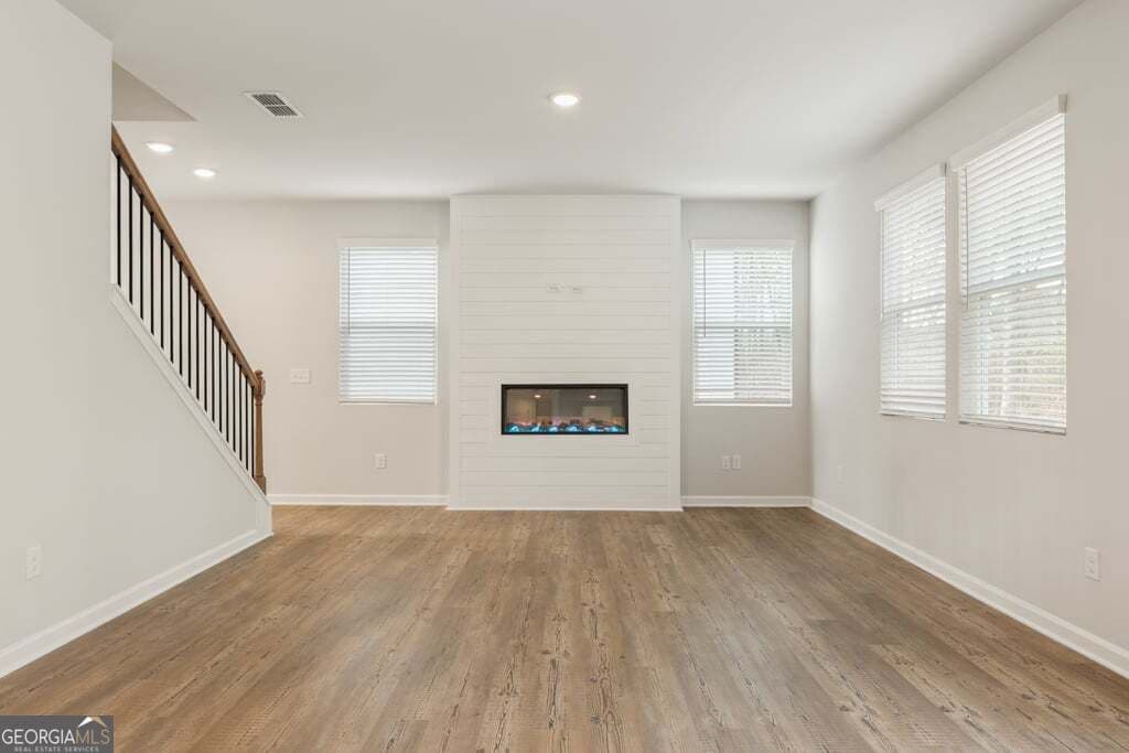 4 bedroom, 4 bathroom, 2,343 sq ft single family residence for sale at 8039 Dickens Drive, Fairburn, GA 30213 — photo 6