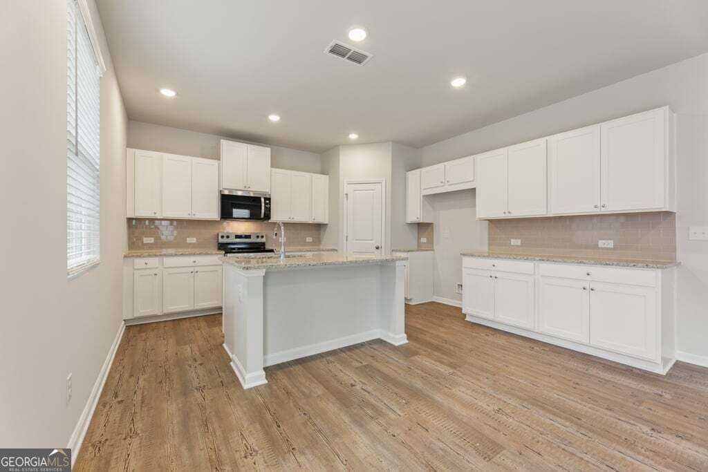 4 bedroom, 4 bathroom, 2,343 sq ft single family residence for sale at 8039 Dickens Drive, Fairburn, GA 30213 — photo 9