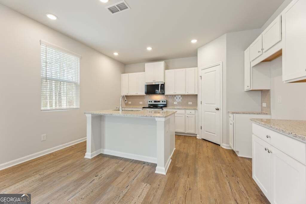 4 bedroom, 4 bathroom, 2,343 sq ft single family residence for sale at 8039 Dickens Drive, Fairburn, GA 30213 — photo 10
