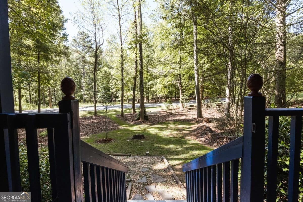 3 bedroom, 2 bathroom, 1,782 sq ft cabin,single family residence for sale at 3383 Wolf Drive, Gainesville, GA 30506 — photo 7