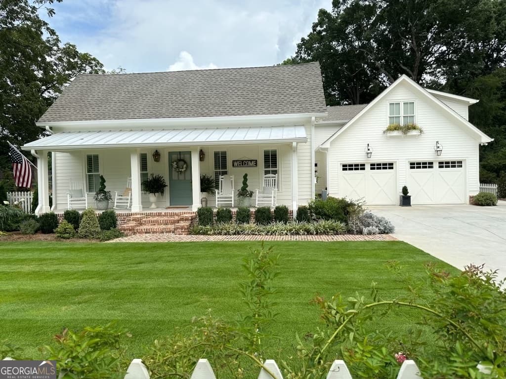 4 bedroom, 4.5 bathroom, 4,176 sq ft single family residence sold at 9656 Davis Street, Braselton, GA 30517