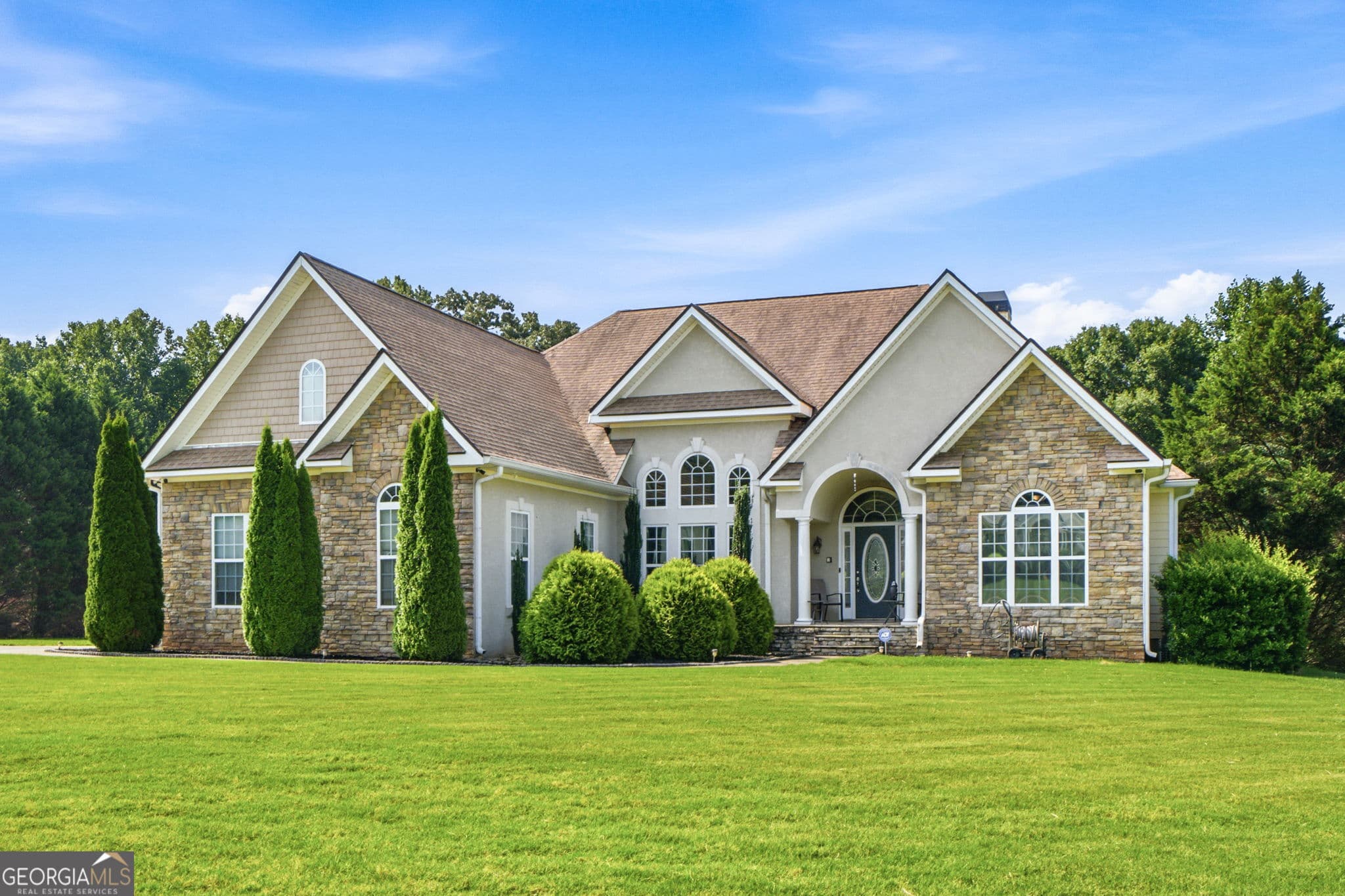 4 bedroom, 3.5 bathroom, 4,324 sq ft single family residence for sale at 130 Citation Court, Forsyth, GA 31029 — photo 2