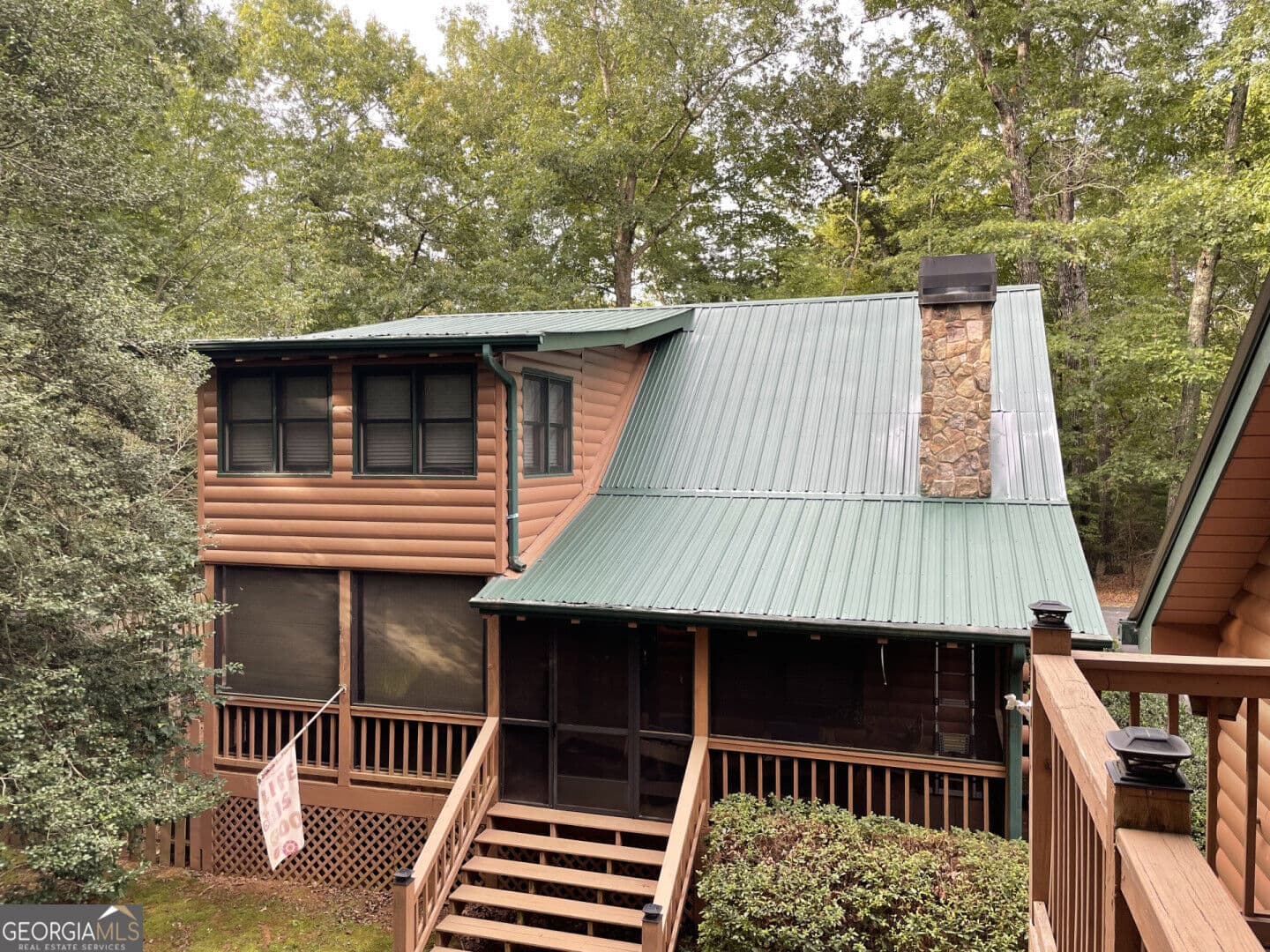 3 bedroom, 3 bathroom, 1,684 sq ft cabin,single family residence for sale at 145 Lake Ridge Drive, Blue Ridge, GA 30513 — photo 2