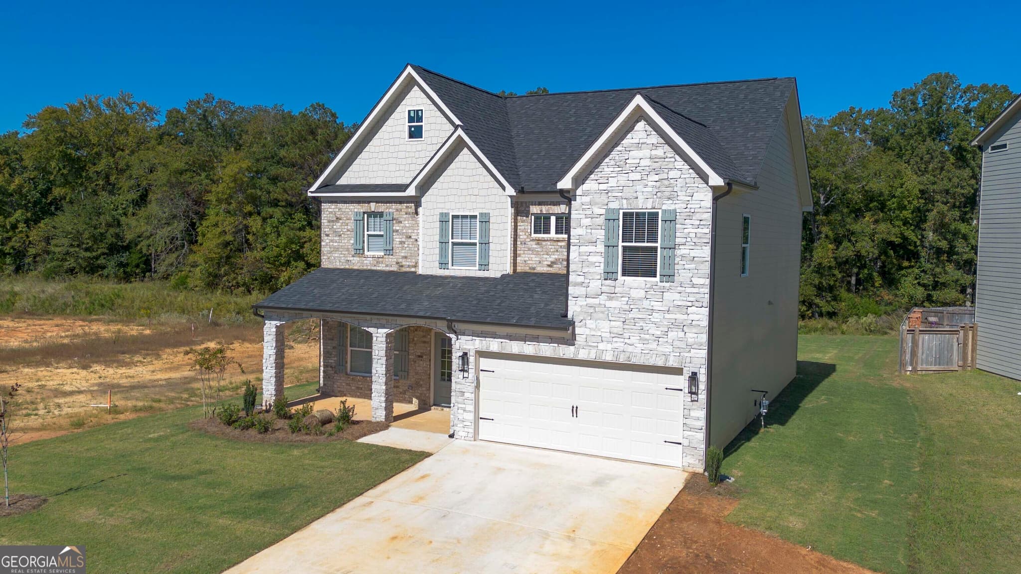 4 bedroom, 3 bathroom, 2,474 sq ft single family residence for sale at 104 Oak Branch Lane, Bonaire, GA 31005 — photo 2