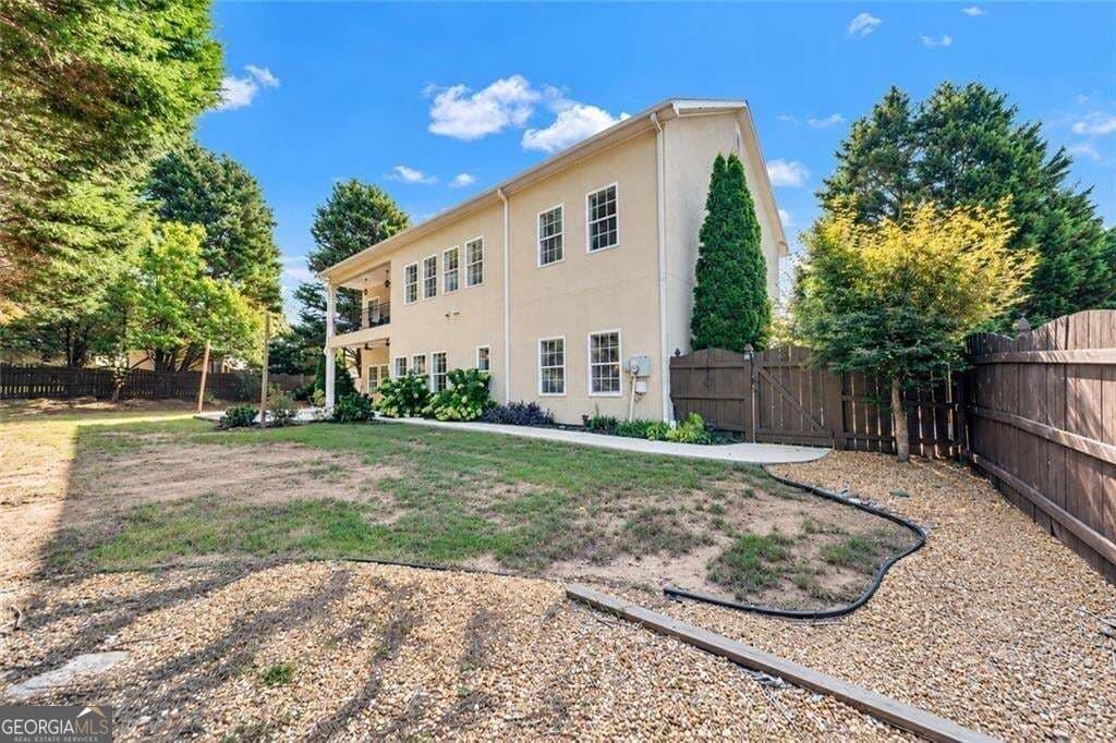 5 bedroom, 4 bathroom, 3,636 sq ft single family residence for sale at 730 River Rush Drive, Sugar Hill, GA 30518 — photo 4