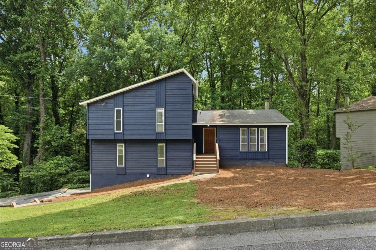 4 bedroom, 2.5 bathroom single family residence for sale at 5005 Green Forest Plwy, Smyrna, GA 30082 — photo 2