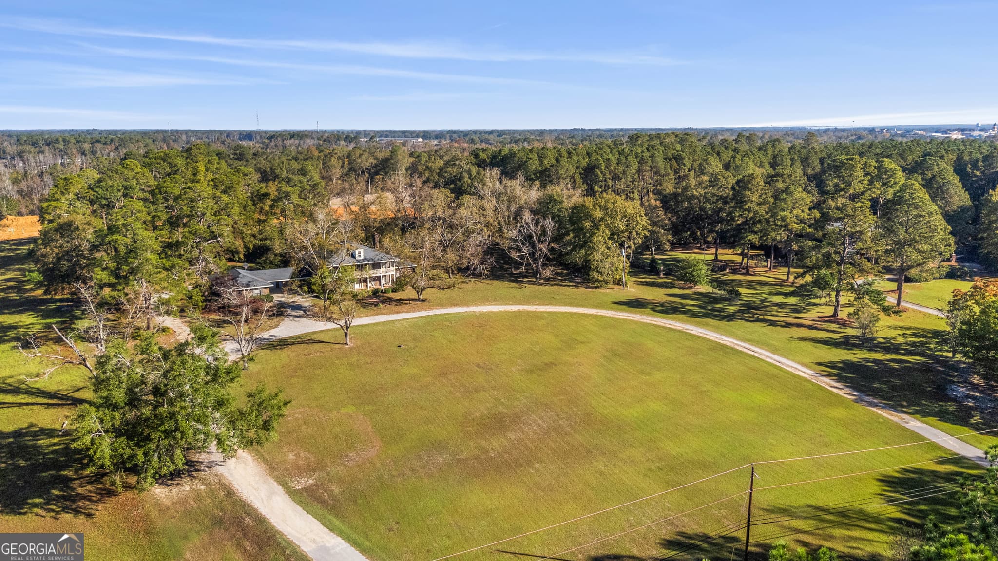 8 bedroom, 6.5 bathroom, 4,564 sq ft single family residence for sale at 5009 Country Club Road, Statesboro, GA 30458 — photo 3