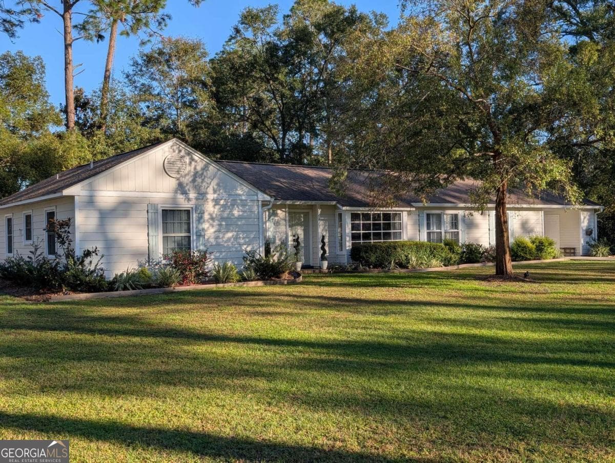 3 bedroom, 2 bathroom, 1,903 sq ft single family residence sold at 673 South Elm Street, Jesup, GA 31546