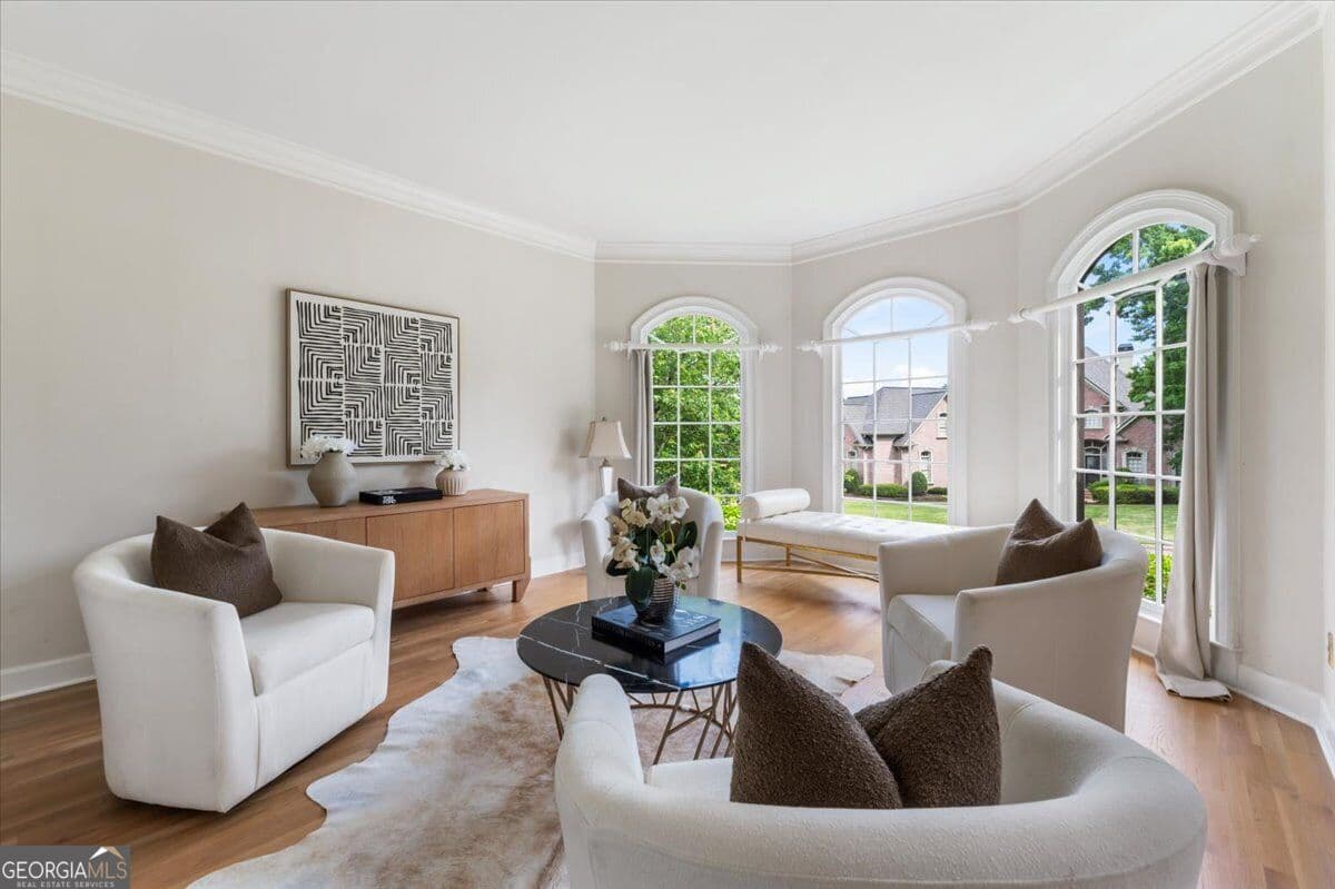 6 bedroom, 4.5 bathroom, 5,905 sq ft single family residence for sale at 9170 Nesbit Lakes Drive, Alpharetta, GA 30022 — photo 7
