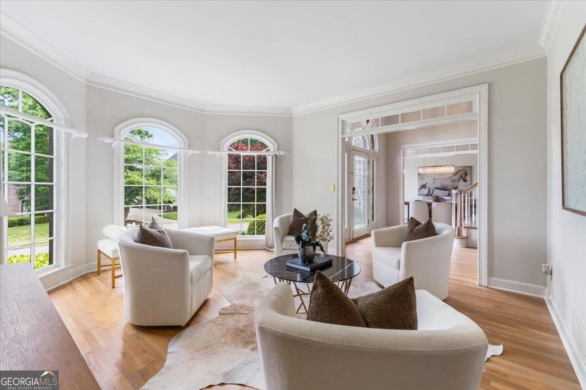 6 bedroom, 4.5 bathroom, 5,905 sq ft single family residence for sale at 9170 Nesbit Lakes Drive, Alpharetta, GA 30022 — photo 9