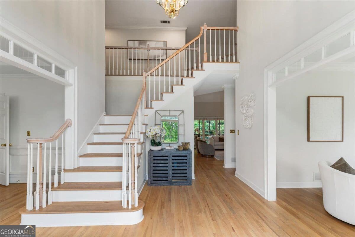 6 bedroom, 4.5 bathroom, 5,905 sq ft single family residence for sale at 9170 Nesbit Lakes Drive, Alpharetta, GA 30022 — photo 4