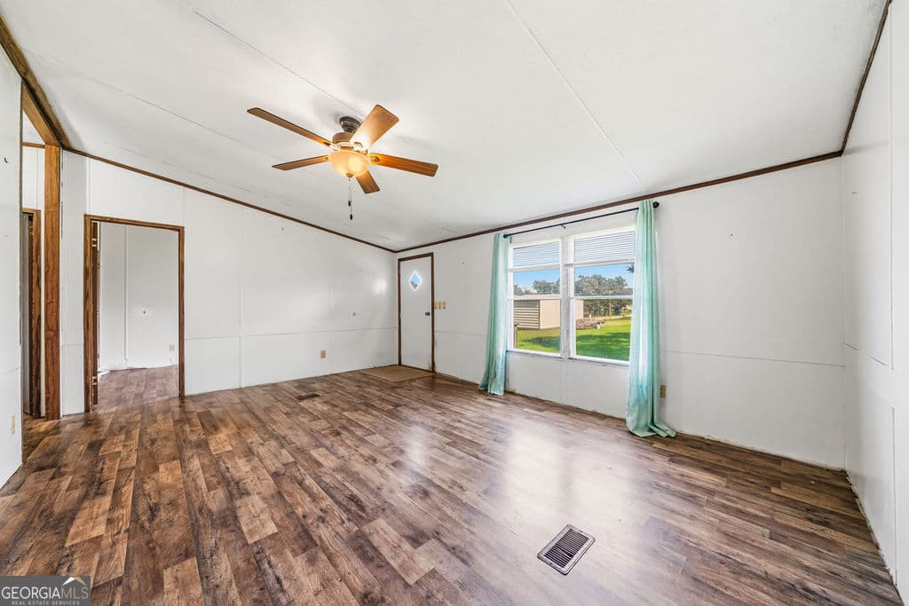 3 bedroom, 2 bathroom, 1,344 sq ft manufactured home,single family residence for sale at 2092 Sand Rock Avenue, Sand Rock, AL 35983 — photo 3