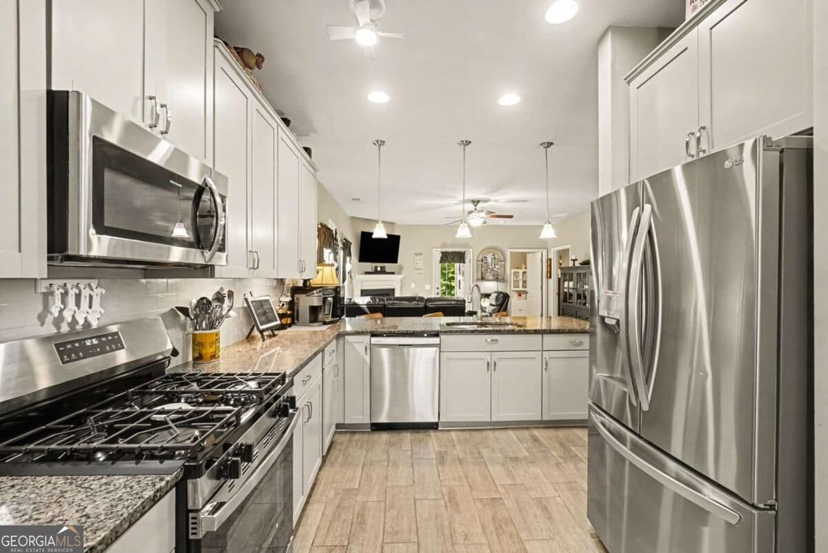 3 bedroom, 2.5 bathroom, 2,210 sq ft single family residence for sale at 121 Prominence Court, Canton, GA 30114 — photo 2
