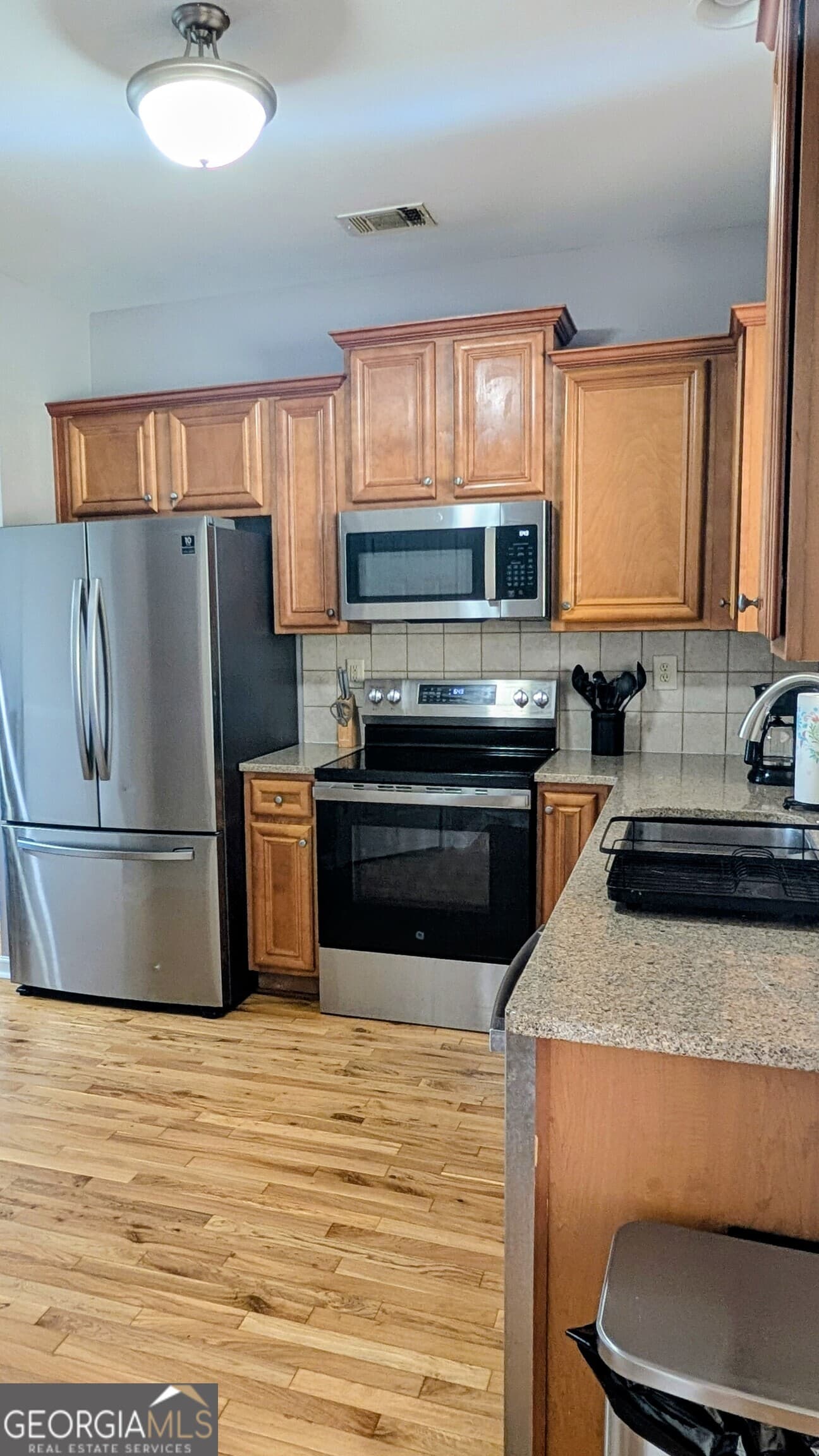 3 bedroom, 3.5 bathroom, 2,476 sq ft townhouse for sale at 3150 Thorngate Court, Snellville, GA 30078 — photo 5