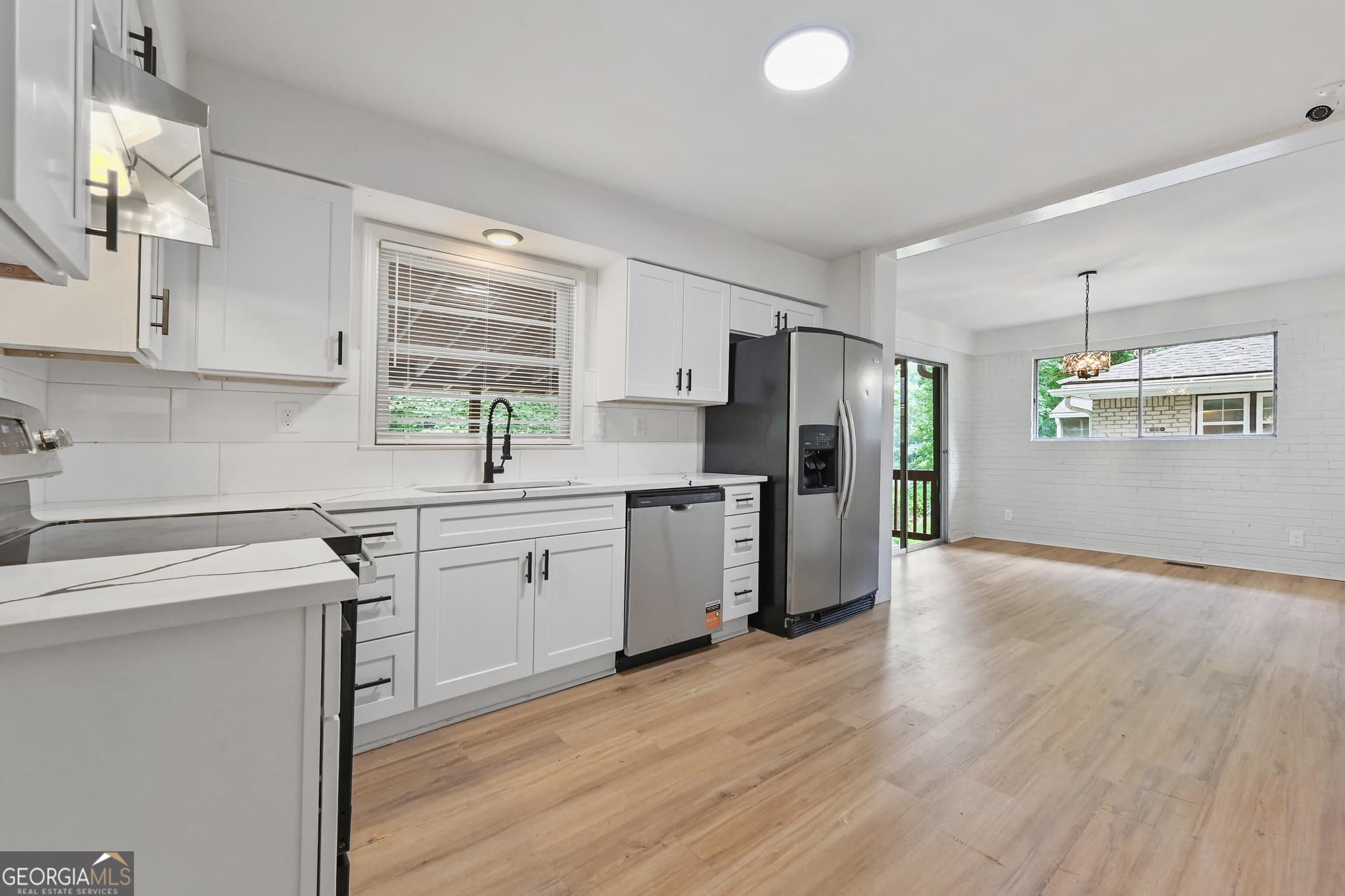 4 bedroom, 3 bathroom, 1,250 sq ft single family residence for sale at 2529 Riggs Drive, East Point, GA 30344 — photo 6