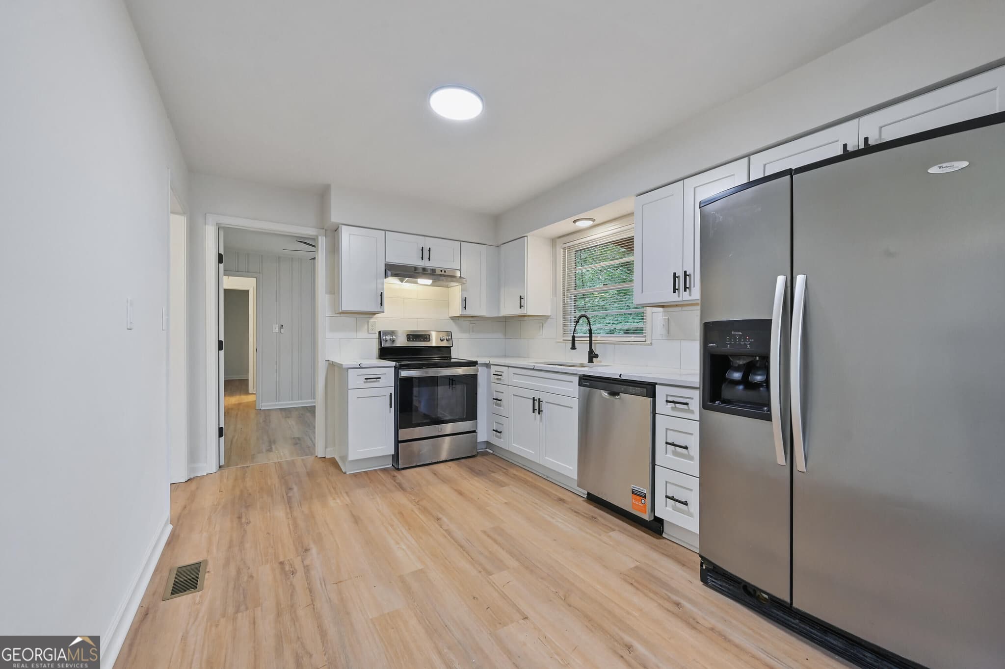 4 bedroom, 3 bathroom, 1,250 sq ft single family residence for sale at 2529 Riggs Drive, East Point, GA 30344 — photo 9