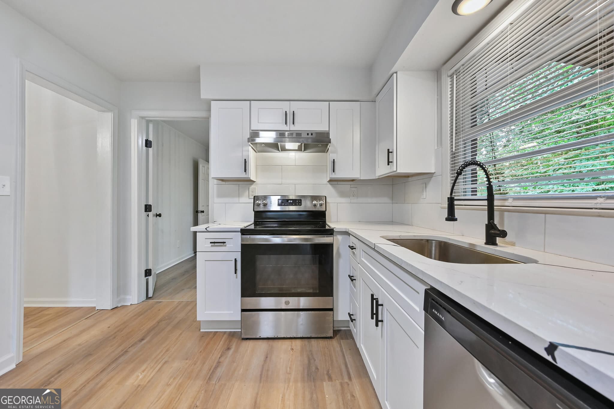 4 bedroom, 3 bathroom, 1,250 sq ft single family residence for sale at 2529 Riggs Drive, East Point, GA 30344 — photo 10