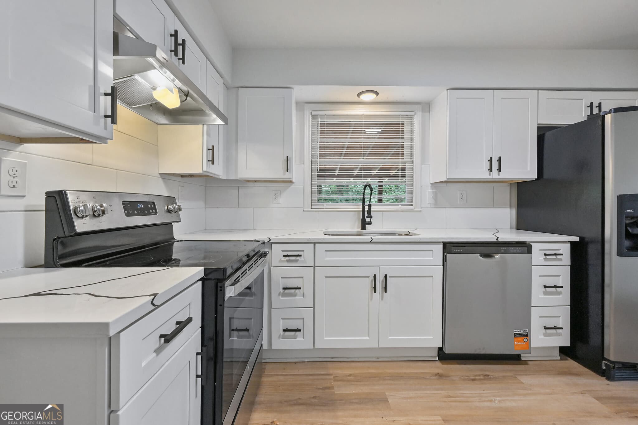 4 bedroom, 3 bathroom, 1,250 sq ft single family residence for sale at 2529 Riggs Drive, East Point, GA 30344 — photo 8