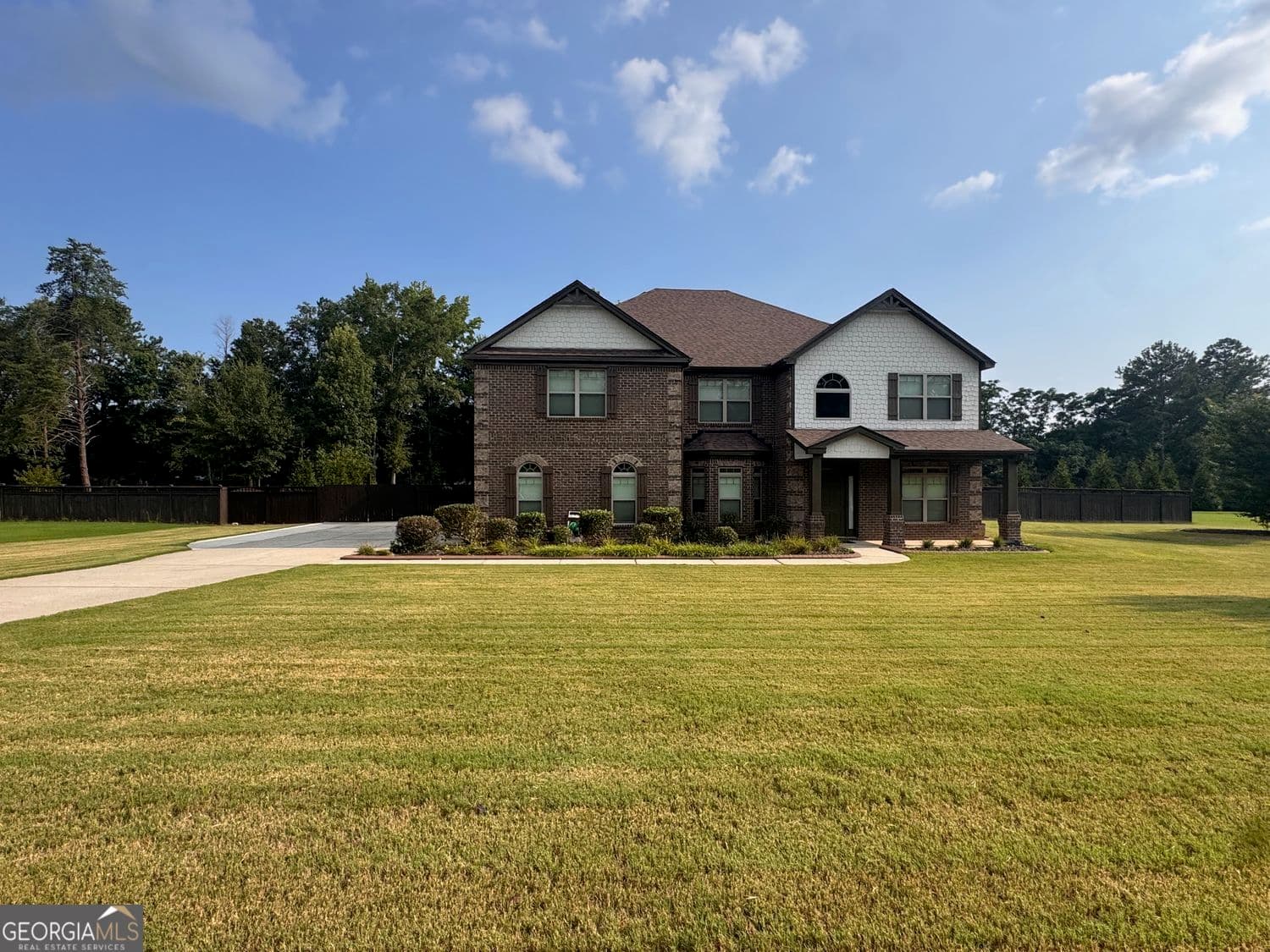 5 bedroom, 4 bathroom, 4,304 sq ft single family residence for sale at 130 Ravens Landing, Fayetteville, GA 30215 — photo 1 of 68