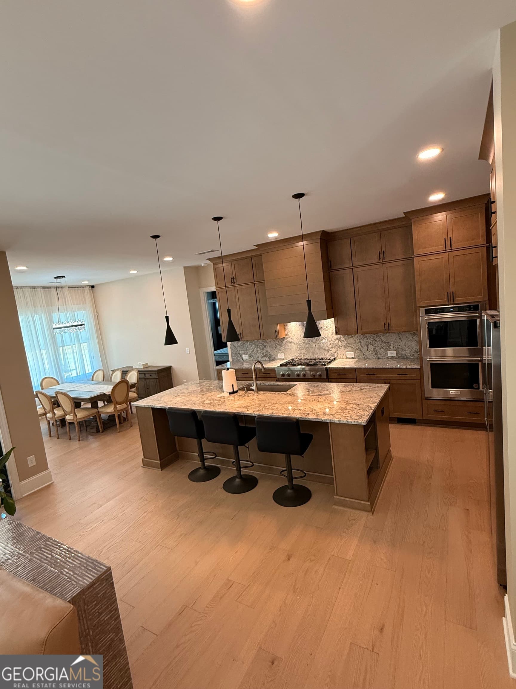 4 bedroom, 3.5 bathroom, 3,187 sq ft single family residence for sale at 6230 BANNISTER VIEW Court, Cumming, GA 30028 — photo 6