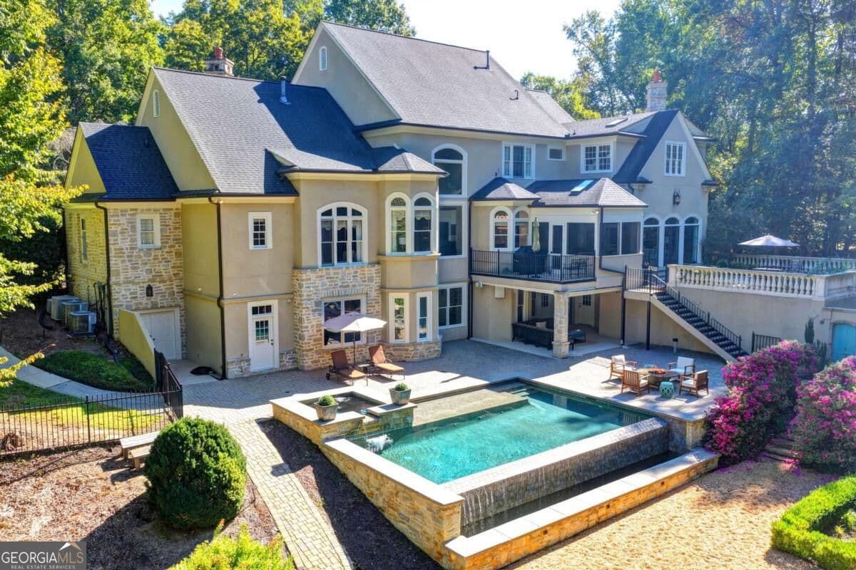 5 bedroom, 5.5 bathroom, 8,584 sq ft single family residence for sale at 440 Old Homestead Trail, Johns Creek, GA 30097 — photo 2